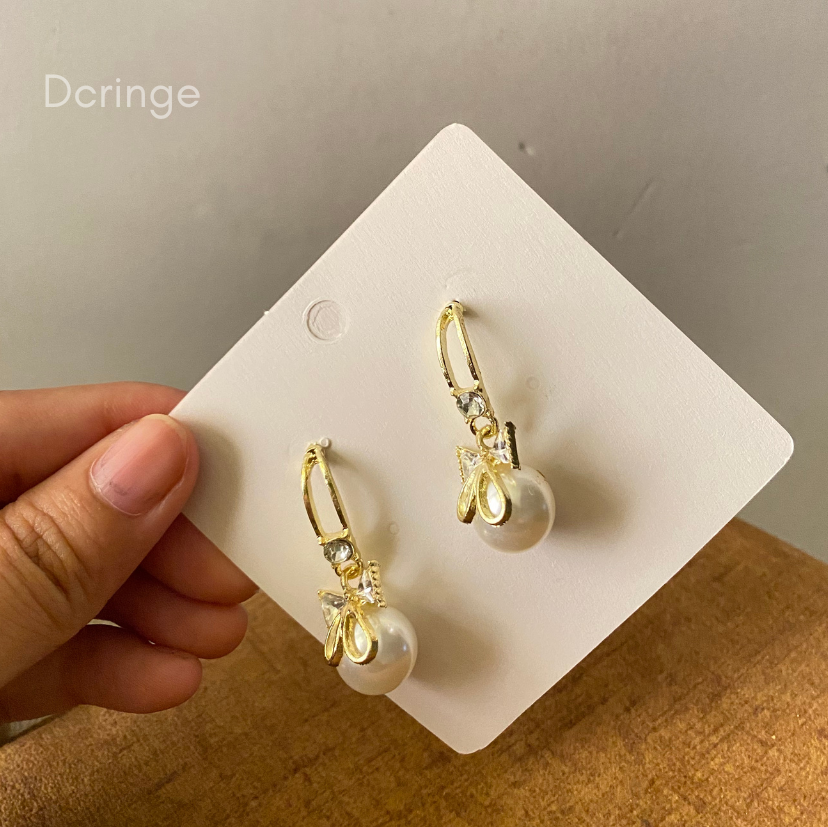 Coquette pearl earrings